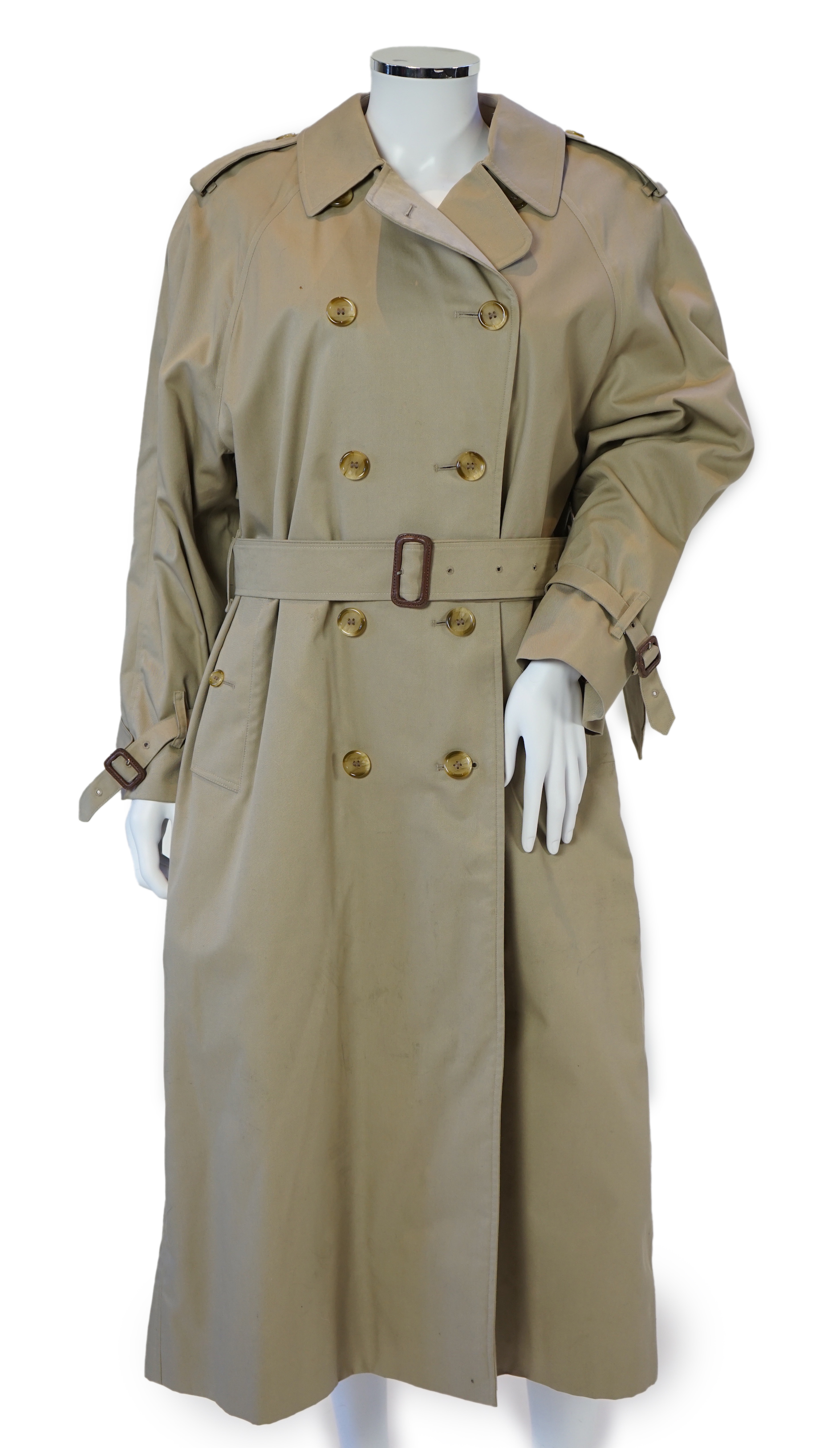 A lady's Burberry trench coat with padded detachable lining, size 12